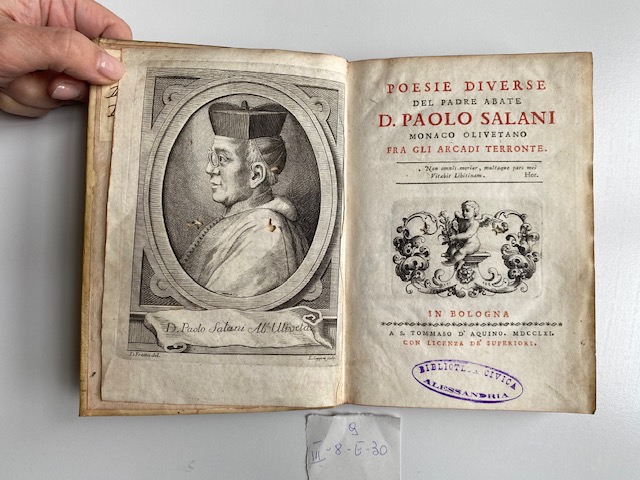 libro aperto alla prima pagina con foto del padre abate don Paolo Salani a sinistra e il titolo del libro nella pagina a destra